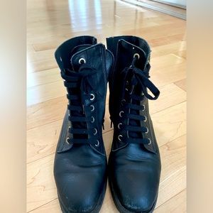 L’Intervalle combat-style lace up boots.  Leather.
